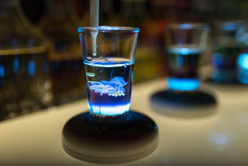 Bartenders are mixing cocktails.colorful cocktails  and Beautiful lights