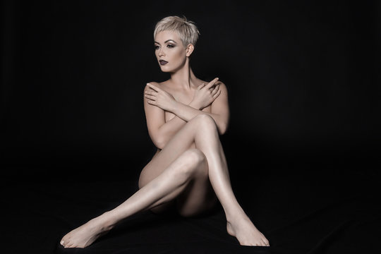 Fototapeta beautiful nude woman with long legs