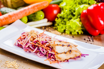 Salad with eel, carrot and red onion