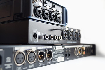 Professional sound equipments with input, output connectors. Selective focus