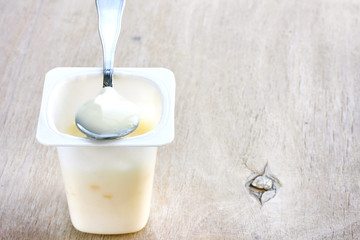Fruit yoghurt in plastic white container