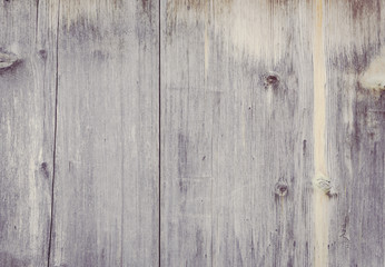 Old rural wooden wall, detailed background photo texture. Wood plank fence close up. Retro color style.
