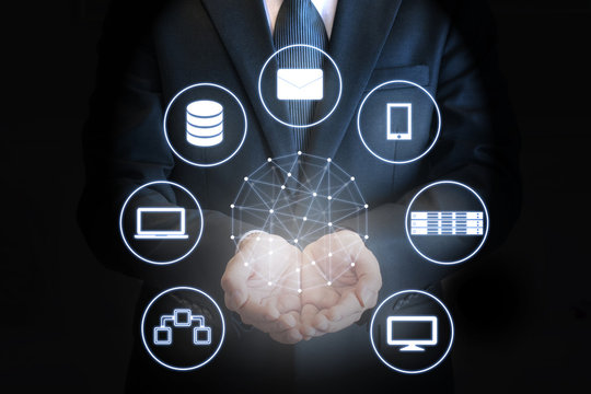 Professional businessman hold world network and technologies connecting in the world on his hands