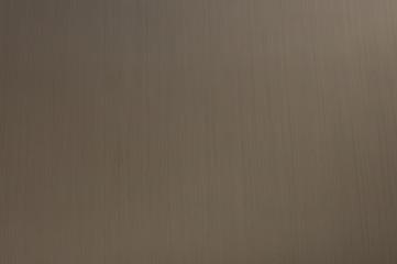 The texture of the metal is stainless steel, with shades, reflecting the surface, longitudinal stripes.