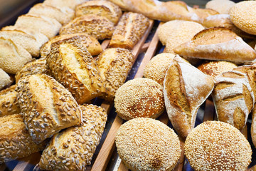 Fresh buns on counter of grocery store