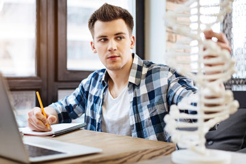 Smart student sdudying dna model
