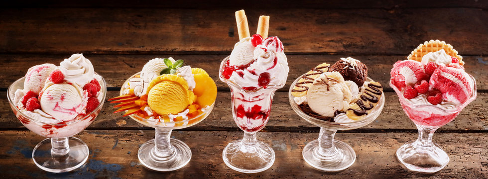 Colorful fresh fruit ice-cream parfait desserts