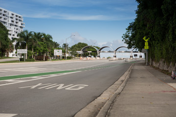 Fototapeta na wymiar Bicycle lane signage on street for special bicycle road on Rickenbacker causeway for Key Biscayne. Near the ocean and Virginia Key. Miami. Florida. USA. Miami neighborhood.