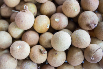 Stack pile of fresh fruit longan. Close up for background