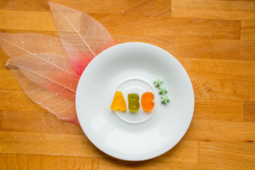 gummy abc letters. sweet tasty alphabet. dessert for learning. kids candy food. Letters ABC for children alphabet. gymmy letters on white, top view