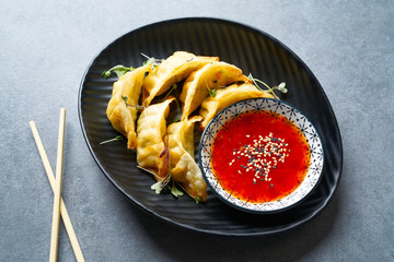 Steamed gyozas teriyaki sauce and sesame
