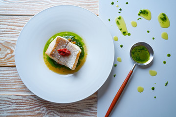 Atlantic hake over dried tomato ratatouille