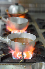 To boiling soup boil in a pot on gas stove