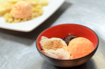 Ice cream melon in red bowl