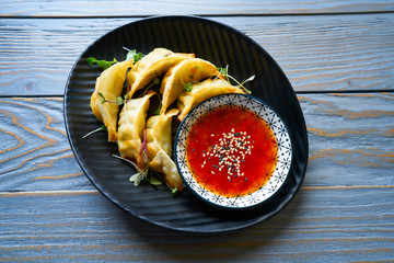 Steamed gyozas with teriyaki sauce