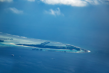Aerial high angle view to tropical islands at Maldives