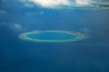 Naklejka na ściany i meble Aerial high angle view to tropical islands at Maldives