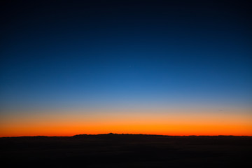 Aerial view from airplane window at twilight