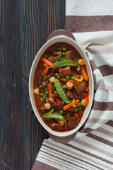 Beef goulash with mushrooms and vegetables