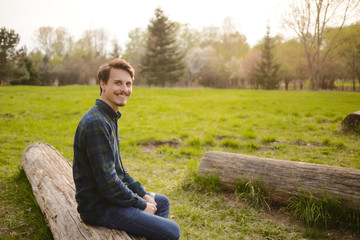 Handsome guy resting in the park