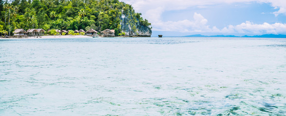 Coastline with Homestay onKri Island. Raja Ampat, Indonesia, West Papua