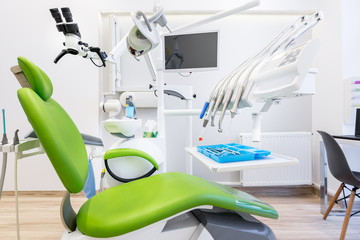 Dental office with green chair