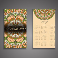 Vector calendar 2017 with decorative elements. Vector mandala design. Template can be used for web and print design.