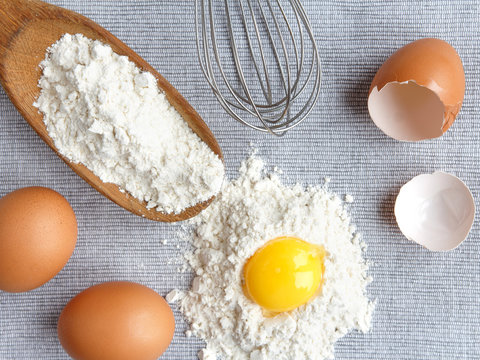 Chicken rind eggs, flour, ingredients and props shape and corolla for cooking homemade baking flat lay