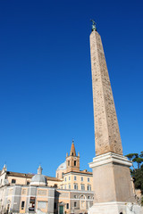 Egyptian Obelisk with star and cross in Piazza del Popolo in Rome Italy
