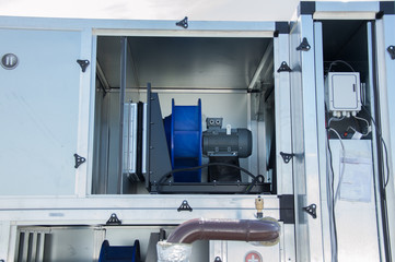 Photo of the vetilation unit part with electric fan motor inside