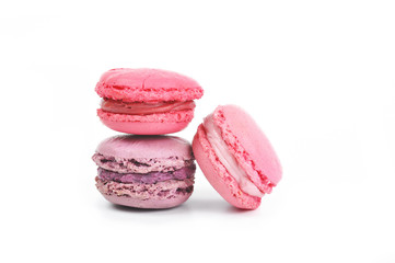 Obraz na płótnie Canvas Three colorful macaroons in different tastes isolated on the white background