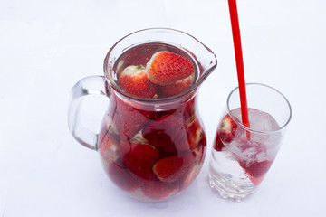 Strawberry drink in a pitcher