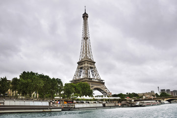 Fototapeta na wymiar PARIS, FRANCE, JULY 4, 2013: The famous Eiffel Tower in Paris, France