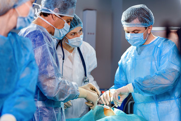 Busy doctors at operating theatre