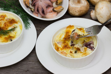 Julienne. mushrooms with cream,octopus,seafood.