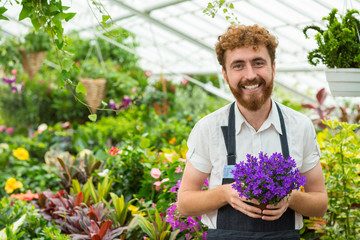 Professional male florist at his garden center