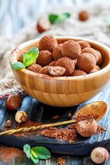 Homemade chocolates with hazelnut filling.