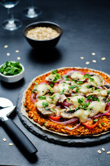 Sweet potato pizza crust with tomato, red onion and mushrooms