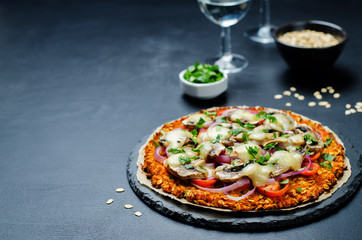 Sweet potato pizza crust with tomato, red onion and mushrooms