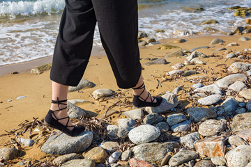 Woman in summer shoes walks