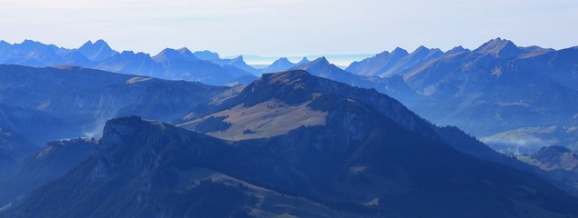 Mountain ranges in the Bernese Oberland just before sunset. View from mount Niesen.