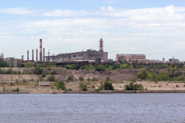 Panoramic view of ironworks on river coastline