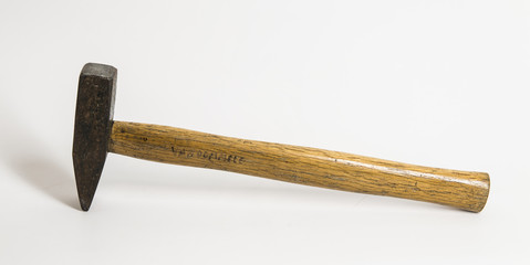 Studio image of a old used hammer