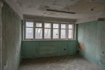 Ruined abandoned room in a house requiring major repairs