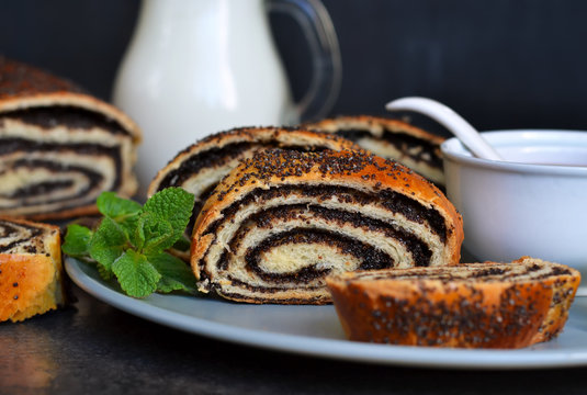 Homemade Roll With Poppy Seeds And Milk For Breakfast