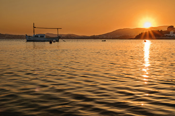 Fototapeta na wymiar sunset over the calm waters of the sea, ibiza, spain
