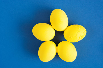  Colored yellow eggs, selective focus image. Happy Easter Card  