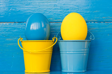  Colored yellow eggs, selective focus image. Happy Easter Card  