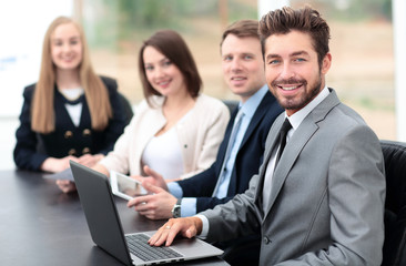 Obraz premium Business colleagues looking at camera in the office