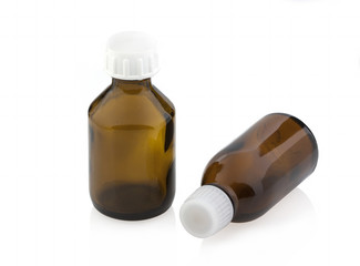 Bottle of medicine brown without label, isolated on white background